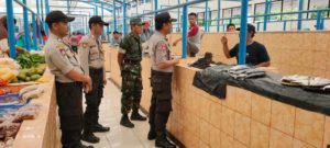 Kapolsek Polsel Pimpin Pengamanan Relokasi Pasar Bulukunyi Takalar