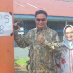 Brigjen Jahidin Nyoblos Di Kompleks IDI TPS 18 Kelurahan Masalle, Panakkukang Makassar, Sulawesi Selatan, didampingi istrinya