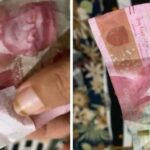 Sebuah video memperlihatkan seorang wanita temukan uang palsu saat arisan di Kota Palopo, Sulawesi Selatan